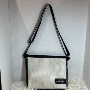 Flat crossbody purse. Made with recycled bicycle tire inner tubes and fabric.